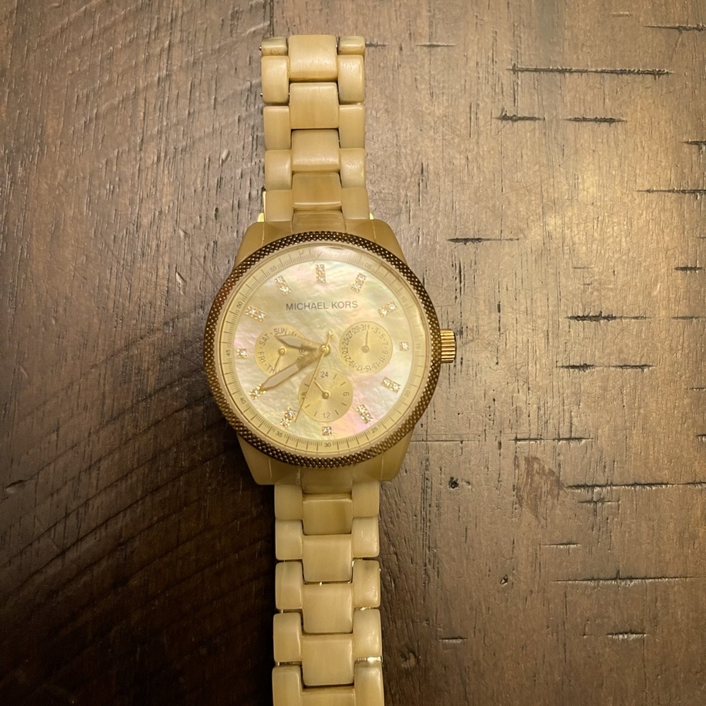 Michael Kors light yellow and pearl face watch